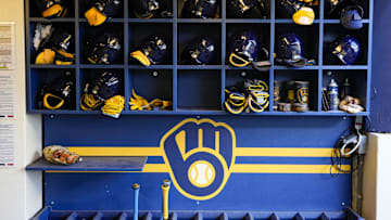 Sep 17, 2024; Milwaukee, Wisconsin, USA;  General view of batting helmets inside the Milwaukee Brewers dugout prior to the game against the Philadelphia Phillies at American Family Field. Mandatory Credit: Jeff Hanisch-Imagn Images