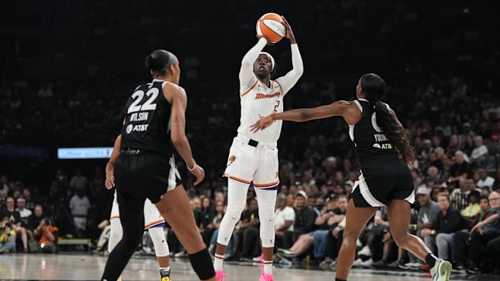 Oct 5, 2025; Las Vegas, Nevada, USA; Phoenix Mercury guard Kahleah Copper (2) shoots the ball against Las Vegas Aces center A'ja Wilson (22) and guard Jackie Young (0) during the first quarter of game two of the 2025 WNBA Finals at Michelob Ultra Arena. Mandatory Credit: Lucas Peltier-Imagn Images Oct 5, 2025; Las Vegas, Nevada, USA; Phoenix Mercury guard Kahleah Copper (2) shoots the ball against Las Vegas Aces center A'ja Wilson (22) and guard Jackie Young (0) during the first quarter of game two of the 2025 WNBA Finals at Michelob Ultra Arena. Mandatory Credit: Lucas Peltier-Imagn Images