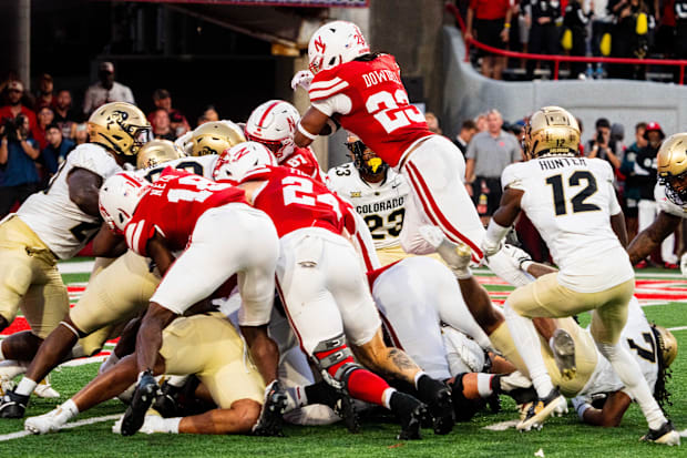 Nebraska Cornhuskers running back Dante Dowdell (23) dives over the pile for a touchdown against the Colorado Buffaloes.