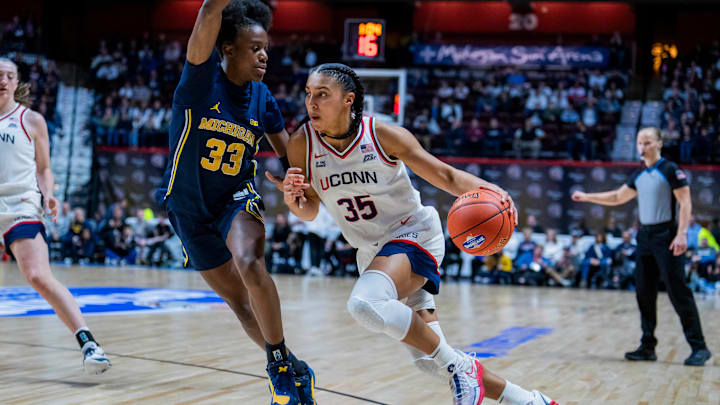 Azzi Fudd (right), who dropped 31 points against Michigan last week, could reunite with a former UConn teammate come draft day. Azzi Fudd (right), who dropped 31 points against Michigan last week, could reunite with a former UConn teammate come draft day.
