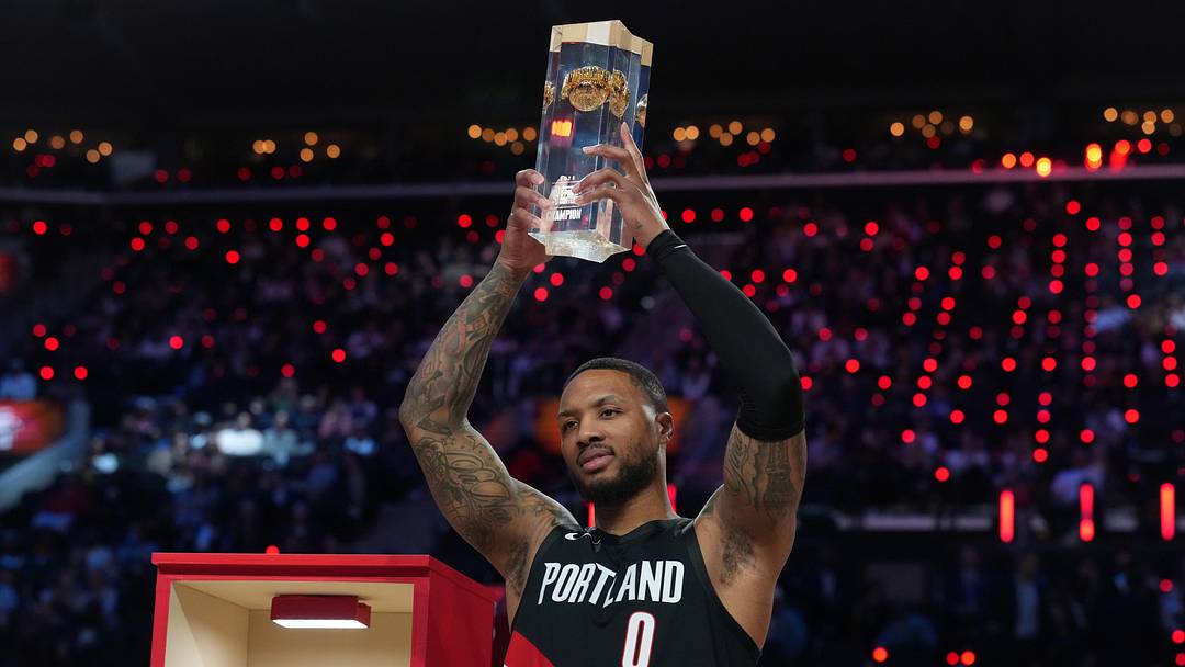 Portland Trail Blazers guard Damian Lillard holds the trophy after winning the three point contest during the 2026 NBA All Star Saturday Night at Intuit Dome. Mandatory Credit: Kirby Lee-Imagn Images