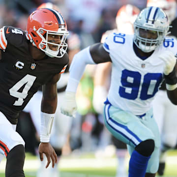 Browns quarterback Deshaun Watson (4) runs from Dallas Cowboys defensive end DeMarcus Lawrence