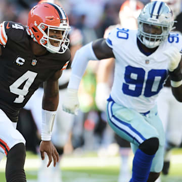 Sep 8, 2024; Cleveland, Ohio, USA; Cleveland Browns quarterback Deshaun Watson (4) runs from Dallas Cowboys linebacker Micah Parsons (11) and defensive end DeMarcus Lawrence (90) during the first quarter at Huntington Bank Field.