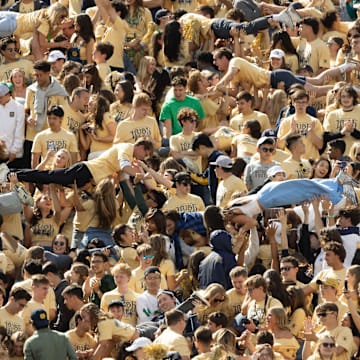 Notre Dame fans are lifted up after a Notre Dame touchdown during a NCAA college football game between Notre Dame and Northern Illinois at Notre Dame Stadium on Saturday, Sept. 7, 2024, in South Bend.