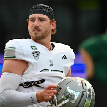 Sep 7, 2024; Seattle, Washington, USA; Eastern Michigan Eagles quarterback Cole Snyder (15) during warmups before the game against the Washington Huskies at Alaska Airlines Field at Husky Stadium. Mandatory Credit: Steven Bisig-Imagn Images