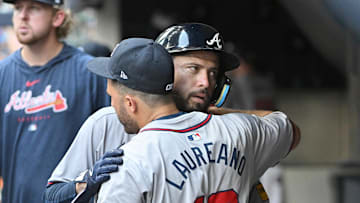 Jul 31, 2024; Milwaukee, Wisconsin, USA; Atlanta Braves catcher Travis d'Arnaud (16) celebrates with outfielder Ramon Laureano (18) after hitting a home run against the Milwaukee Brewers in the fourth inning  at American Family Field. Mandatory Credit: Michael McLoone-Imagn Images