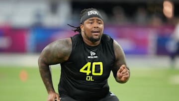 Feb 27, 2025; Indianapolis, IN, USA; Ohio State defensive lineman Tyleik Williams (DL40) participates in drills during the 2025 NFL Combine at Lucas Oil Stadium. Mandatory Credit: Kirby Lee-Imagn Images