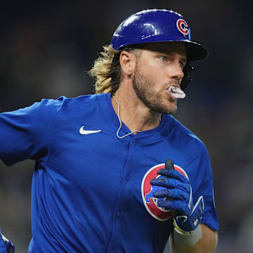 Aug 24, 2024; Miami, Florida, USA;  Chicago Cubs first base Patrick Wisdom (16) rounds the bases after hitting a two-run home run in the ninth inning against the Miami Marlins at loanDepot Park. 