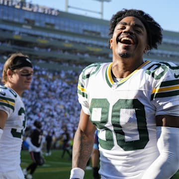 Green Bay Packers wide receiver Bo Melton celebrates as he runs off the field following the game against the Houston Texans.