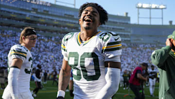 Oct 20, 2024; Green Bay, Wisconsin, USA;  Green Bay Packers wide receiver Bo Melton (80) celebrates as he runs off the field following the game against the Houston Texans at Lambeau Field. Mandatory Credit: Jeff Hanisch-Imagn Images