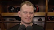 Tkachuk speaking to the media. 