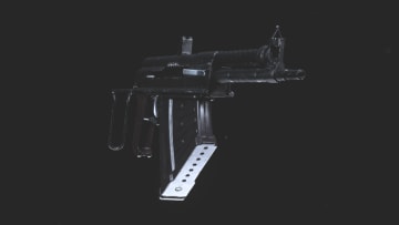 "Full-auto submachine gun. Underwater rifle modified for improved land performance. Fires 5.56mm steel darts with moderate bullet velocity."