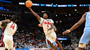 Mar 21, 2025; Milwaukee, WI, USA; Mississippi Rebels guard Jaylen Murray (5) shoots during the second half of a first round NCAA men’s tournament game against the North Carolina Tar Heels at Fiserv Forum. Mandatory Credit: Benny Sieu-Imagn Images