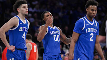 Dec 21, 2024; New York, New York, USA; Kentucky Wildcats guard Otega Oweh (00) reacts during the second half against the Ohio State Buckeyes at Madison Square Garden. Mandatory Credit: John Jones-Imagn Images