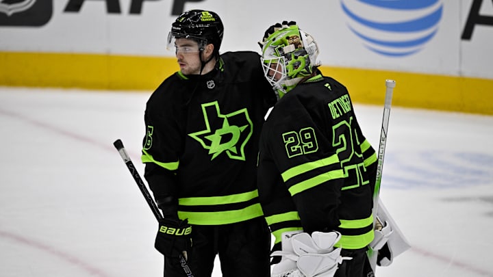 Apr 3, 2025; Dallas, Texas, USA; Dallas Stars defenseman Lian Bichsel (6) and goaltender Jake Oettinger (29) celebrate the win over the Nashville Predators at the American Airlines Center. Mandatory Credit: Jerome Miron-Imagn Images
