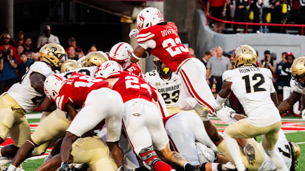 Nebraska Cornhuskers running back Dante Dowdell (23) dives over the pile for a touchdown against the Colorado Buffaloes