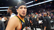 Apr 28, 2024; Phoenix, Arizona, USA; Phoenix Suns guard Devin Booker (1) leaves the court after game four of the first round for the 2024 NBA playoffs against the Minnesota Timberwolves at Footprint Center. Mandatory Credit: Joe Camporeale-Imagn Images