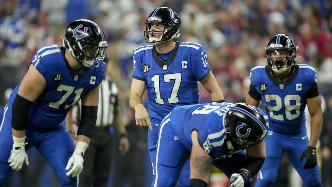 Dec 22, 2025; Indianapolis, Indiana, USA; Indianapolis Colts quarterback Philip Rivers (17) yells from behind the line of scrimmage during a game against the San Francisco 49ers at Lucas Oil Stadium. 