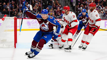 Nov 9, 2024; Denver, Colorado, USA; Colorado Avalanche center Nathan MacKinnon (29) celebrates his second period goal against the Carolina Hurricanes at Ball Arena. Mandatory Credit: Ron Chenoy-Imagn Images