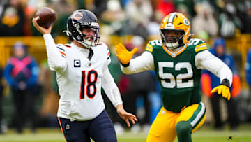 Defensive end Rashan Gary chases quarterback Caleb Williams during a matchup between the Green Bay Packers and Chicago Bears