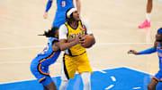 Jun 22, 2025; Oklahoma City, Oklahoma, USA; Indiana Pacers center Myles Turner (33) looks to shoot while Oklahoma City Thunder guard Cason Wallace (22) defends during the first half of game seven of the 2025 NBA Finals at Paycom Center. Mandatory Credit: Kyle Terada-Imagn Images