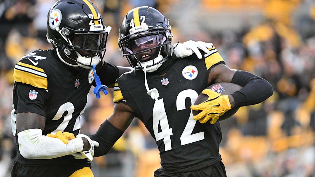 Nov 16, 2025; Pittsburgh, Pennsylvania, USA; Pittsburgh Steelers cornerback James Pierre (42) celebrates with cornerback Joey Porter Jr. (24) after scoring a touchdown against the Cincinnati Bengals during the fourth quarter at Acrisure Stadium.