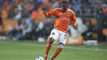 Feb 22, 2025; Houston, Texas, USA; Houston Dynamo FC forward Ibrahim Aliyu (18) in action during the match against FC Dallas at Shell Energy Stadium. Mandatory Credit: Troy Taormina-Imagn Images