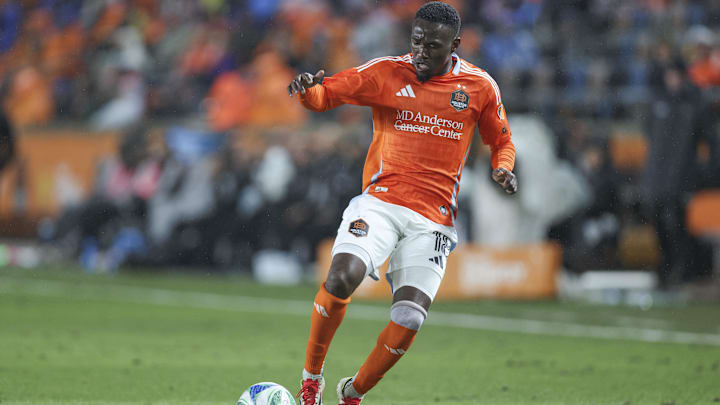 Feb 22, 2025; Houston, Texas, USA; Houston Dynamo FC forward Ibrahim Aliyu (18) in action during the match against FC Dallas at Shell Energy Stadium. Mandatory Credit: Troy Taormina-Imagn Images