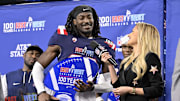Jan 30, 2025; Arlington, TX, USA; East defensive back O'Donnell Fortune of South Carolina (20) is presented with the defensive MVP trophy after the East defeats the West in the East-West Shrine Bowl at AT&T Stadium.  