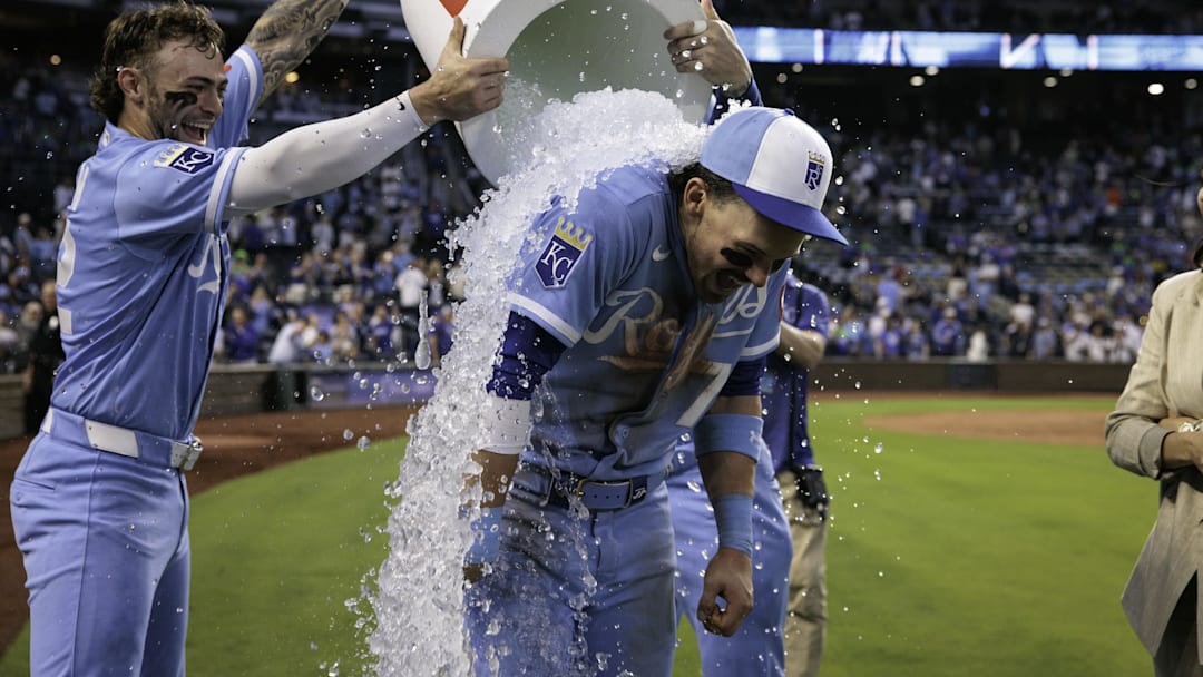 May 9, 2026; Kansas City, Missouri, USA; Kansas City Royals catcher Carter Jensen (22) dumps water on shortstop Bobby Witt Jr. (7) after the game against the Detroit Tigers at Kauffman Stadium. Mandatory Credit: William Purnell-Imagn Images