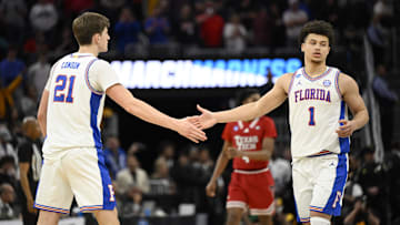 Mar 29, 2025; San Francisco, CA, USA; Florida Gators forward Alex Condon (21) and Florida Gators guard Walter Clayton Jr. (1) high-five during the second half against the Texas Tech Red Raiders during the West Regional final of the 2025 NCAA tournament at Chase Center. Mandatory Credit: Eakin Howard-Imagn Images