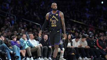 Nov 18, 2025; Los Angeles, California, USA; Los Angeles Lakers forward LeBron James (23) reacts against the Utah Jazz in the fourth quarter at Crypto.com Arena. Mandatory Credit: Kirby Lee-Imagn Images