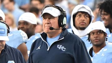 Nov 22, 2025; Chapel Hill, North Carolina, USA; North Carolina Tar Heels head coach Bill Belichick watches play during the first half at Kenan Stadium. Mandatory Credit: William Howard-Imagn Images