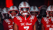 Aug 28, 2025; Raleigh, North Carolina, USA; North Carolina State Wolfpack tight end Justin Joly (7) looks on during the warmups prior to the game against East Carolina Pirates at Carter-Finley Stadium. Mandatory Credit: Jaylynn Nash-Imagn Images