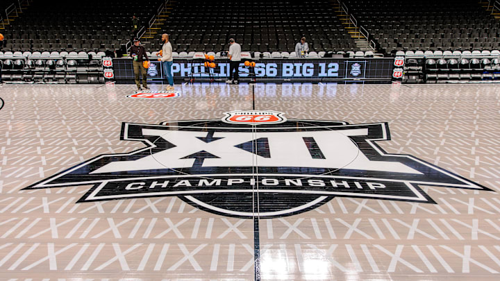 Mar 13, 2026; Kansas City, MO, USA; Big 12 logo center court after the LED floor was removed and a traditional wood floor was installed for the remaining tournament games prior to the game between the Iowa State Cyclones and the Arizona Wildcats at T-Mobile Center. Mandatory Credit: William Purnell-Imagn Images