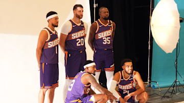 Sep 30, 2024; Phoenix, AZ, USA; Phoenix Suns guard Devin Booker (1) and Phoenix Suns center Jusuf Nurkic (20) and Phoenix Suns forward Kevin Durant (35) and Phoenix Suns guard Bradley Beal (3) and Phoenix Suns guard Tyus Jones (21) pose for a photo during Media Day at Footprint Center. Mandatory Credit: Joe Camporeale-Imagn Images