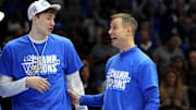 Mar 15, 2025; Charlotte, NC, USA; Duke Blue Devils forward Cooper Flagg (2) and head coach Jon Scheyer celebrate after winning the 2025 ACC Conference Championship game against the Louisville Cardinals at Spectrum Center. Mandatory Credit: Bob Donnan-Imagn Images