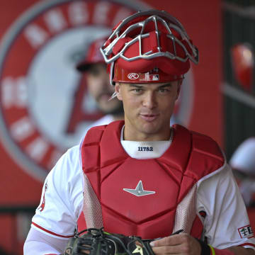 Jun 4, 2024; Anaheim, California, USA;  Los Angeles Angels catcher Logan O'Hoppe (14) in the dugout during the game against the San Diego Padres at Angel Stadium. Mandatory Credit: Jayne Kamin-Oncea-USA TODAY Sports