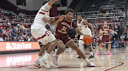 Feb 26, 2025; Stanford, California, USA;  Boston College Eagles forward Elijah Strong (31) controls the ball during the second half against Stanford Cardinal forward Donavin Young (2) at Maples Pavilion. Mandatory Credit: Stan Szeto-Imagn Images