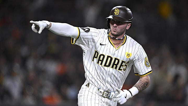 Sep 16, 2024; San Diego, California, USA; San Diego Padres center fielder Jackson Merrill (3) gestures toward the Padres dugout after hitting a home run against the Houston Astros during the fourth inning at Petco Park.