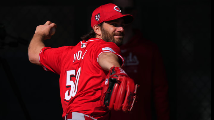 Cincinnati Reds pitcher Sam Moll delivers a pitch in the bullpen during spring training workouts,