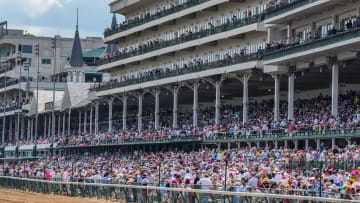 Racing fans watch races from the stands Saturday, May 4, 2024, ahead of the 150th running of the