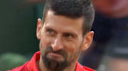Djokovic's priceless reaction to the end of a 26-shot rally vs. Sinner. 