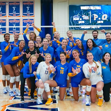 Pitt Volleyball celebrates their sweep over Pepperdine in Malibu, Calif. 