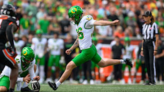 Sep 14, 2024; Corvallis, Oregon, USA; Oregon Ducks place kicker Atticus Sappington (36) kicks an extra point during the first quarter against the Oregon State Beavers at Reser Stadium. Mandatory Credit: Craig Strobeck-Imagn Images