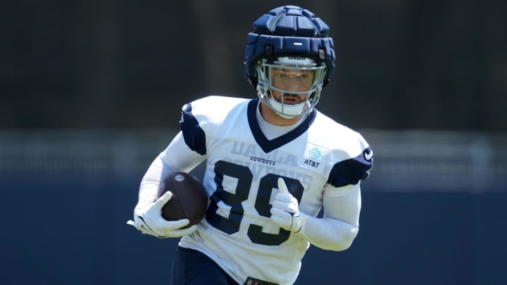 Dallas Cowboys tight end Peyton Hendershot (89) wears a Guardian helmet cap during training camp at the River Ridge Fields