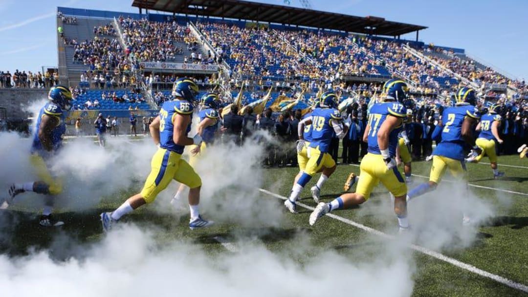 Blue Hens enter Delaware Stadium before a football game.