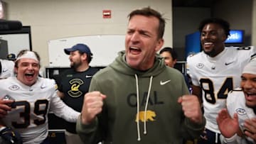 Justin Wilcox celebrates Cal's win at Louisville