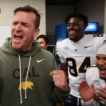 Justin Wilcox celebrates Cal's win at Louisville