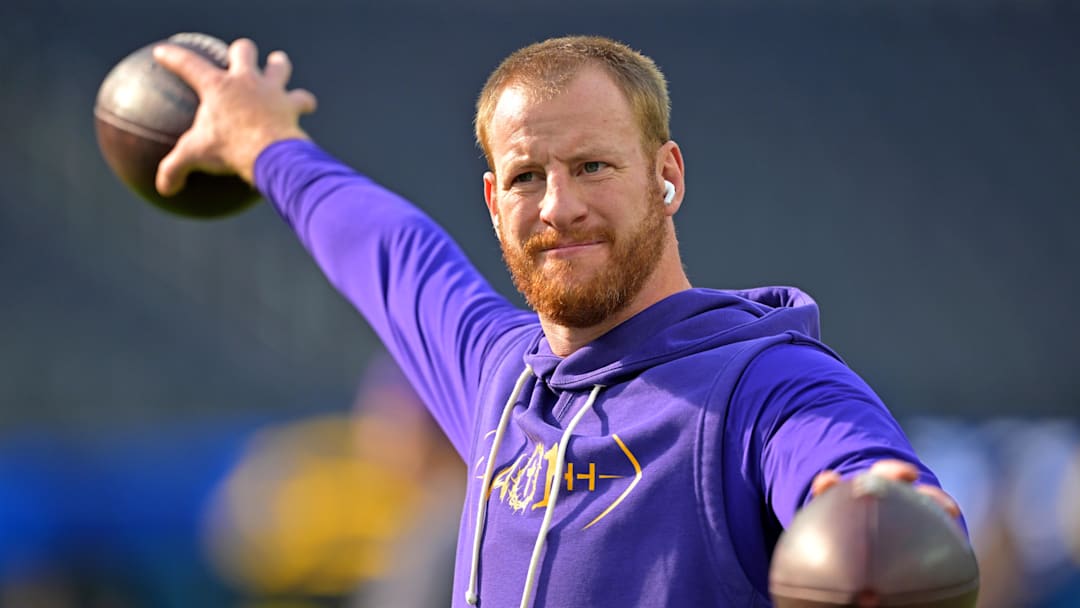 Oct 23, 2025; Inglewood, California, USA;  Minnesota Vikings quarterback Carson Wentz (11) warms up prior to the game against the Los Angeles Chargers at SoFi Stadium. Mandatory Credit: Jayne Kamin-Oncea-Imagn Images